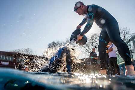 Participants poured buckets of ice water on one another
