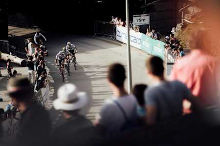 The lead riders enter the finishing straight during a lap of the XCC race at the UCI XCO World Cup at Lenzerheide, Switzerland, on August9, 2019.