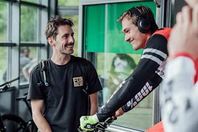 Chris Kilmurray talks to a rider ahead of racing.