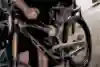 Aaron Gwin's mechanic John Hall plays around the the YT Tues rear shock settings.