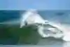 Kanoa Igarashi performs a turn while going fast at Jeffreys Bay in South Africa