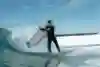 Julian Wilson narrowly avoids getting hit by the floating grind box while surfing at the URBNSURF wave pool in Melbourne during his The Rail Project.