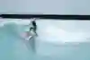 Julian Wilson performs rail grinds while surfing at the URBNSURF wave pool in Melbourne during his The Rail Project.