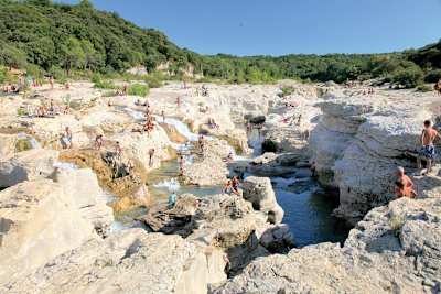 You can even slide down the limestone cliffs at Cascade du Sautadet