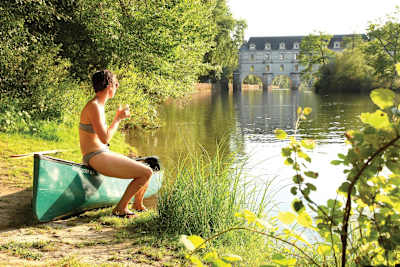 Swim under the uniquely imposing landmark that is Chenonceaux