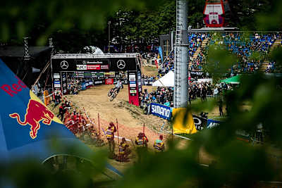 Maribor finish line seen through the trees during DH Finals 2019.