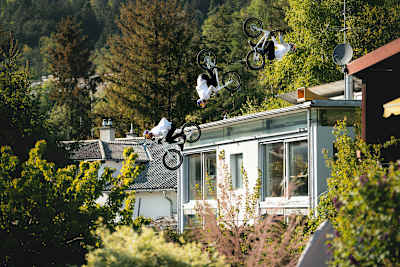 MTb rials rider Fabio Wibmer Backflips off his roof during filming of video, Home Office.
