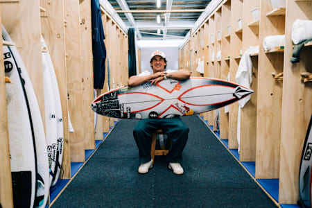 Jack Robinson with his surfboard at the Margaret River Pro