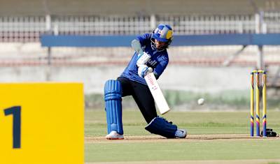 Indian women's cricket team opening batter Smriti Mandhana plays a shot.