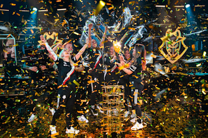 G2 Gozen hold up the championship trophy after victory at the VALORANT Game Changers Championship.
