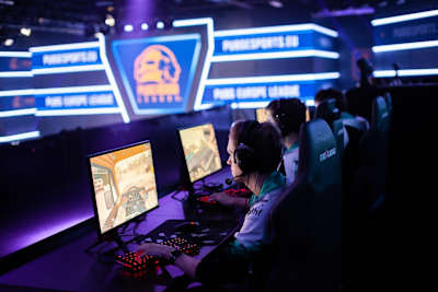 Professional players competing in PUBG at the official European league, PEL