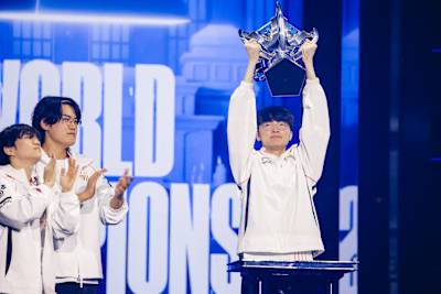 Faker of T1 pictured with the trophy after winning the 2024 League of Legends World Championships in London, UK.