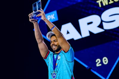 Arslan Ash shows off his trophy after his Tekken 8 Grand Final win at EVO Championship Series in Las Vegas, Nevada, USA on August 3, 2025. 