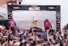 Justine Dupont, Clement Roseryo and Nic von Rupp on the podium at the Nazare Big Wave Challenge