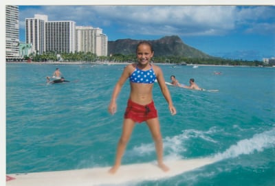 An image of surfer Carissa Moore as a child.