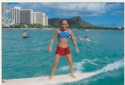 An image of surfer Carissa Moore as a child.