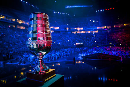 The ESL One trophy and an arena full of CS:GO fans.