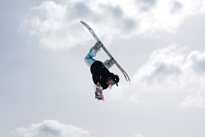 Zeb Powell hits a jump reading the Red Bulletin at Red Bull Slide-In Tour
