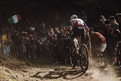 Titouan Carod racing at the 2022 Val di Sole UCI XCO MTB World Cup.