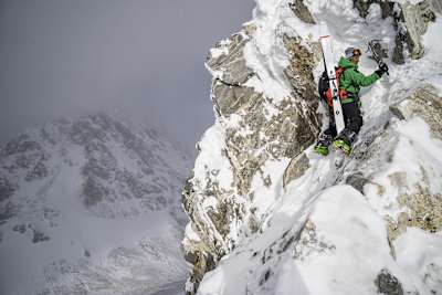 Jimmy Chin using an ice axe while ski mountaineering in the Tetons.