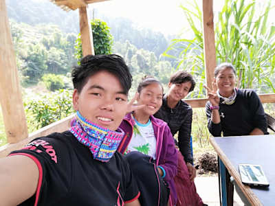 An image of Mira Rai and the Exchange and Empower team.