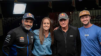 Nasser Al-Attiyah and Carlos Sainz pose with In the Dust hosts Nicola Hume and Matt Jones