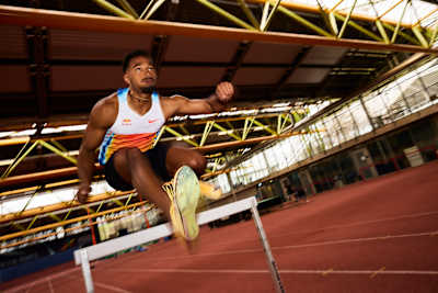 Leo Neugebauer in the 110 metre hurdles sprint. 
