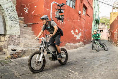 Darcy Wittenburg, Anytime director, films Thomas Genon on bike in Guanajuato streets, Mexico.