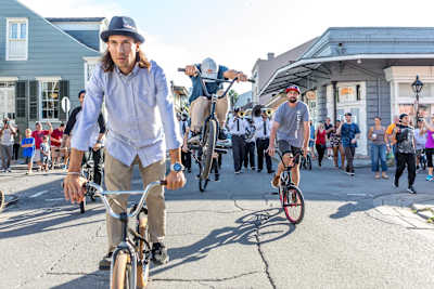 The Second Line BMX Flatland group lead the jazz marching band in New Orleans