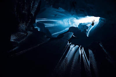 Will Gadd rappells into the Greenland icecap moulin during his trip to explore the Greenland ice cap in 2018.