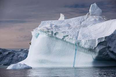 Climber Will Gadd scales a massive ice mass during his trip to explore the Greenland ice cap in 2018.