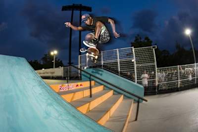 Zion Wright lands a Frontside Shove-it Kickflip at a demo in Osaka during the Red Bull Drop-In Tour of Japan.