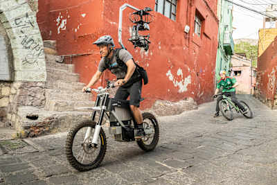 Darcy Wittenburg, Anytime director, films Thomas Genon on bike in Guanajuato streets, Mexico.