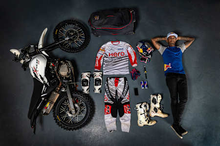 CS Santosh poses for a photo with his rally equipment