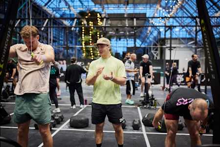 Victor Hoffer coaching the functional fitness community at the World Fitness Project Finals