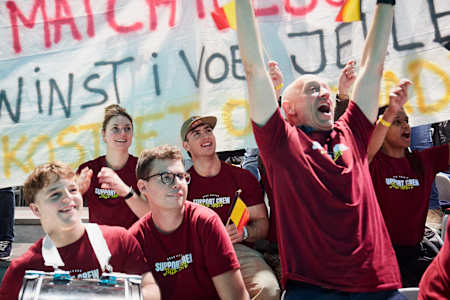 Victor Hoffer cheering for his team-mate Jelle with Belgian fans at the World Fitness Project finals.