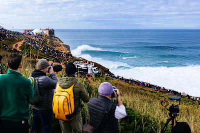 The big wave lineup at Praia do Norte, Nazaré, Portugal