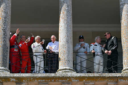F1 World Champions from l to r, Nigel Mansell, Alain Prost, Mario Andretti, Sir Jackie Stewart, Emerson Fittipaldi, Jacques Villeneuve and Mika Hakkinen on the balcony at the 2025 Festival of Speed.