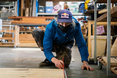 Murray Loubser helps in the build of a BMX kicker ramp.