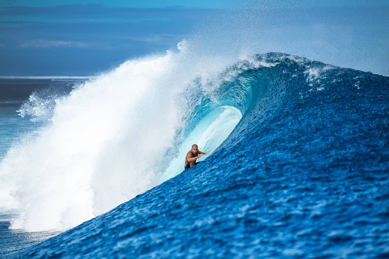 Tevita Gukilau surfs at Cloudbreak in Fiji. 