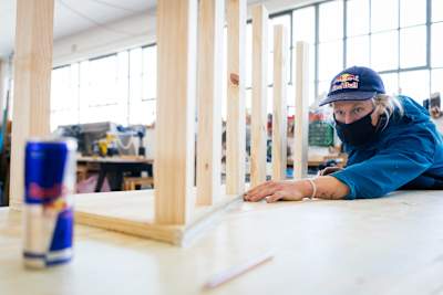 Murray Loubser helps in the build of a BMX kicker ramp.