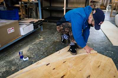 Murray Loubser helps in the build of a BMX kicker ramp.