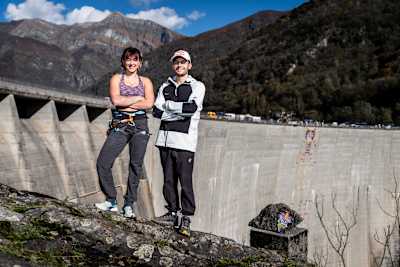 Jenya Kazbekova of Ukraine and Alberto Gines Lopez of Spain at the Verzasca Dam, Switzerland, during the Red Bull Dual Ascent on October 29, 2024.