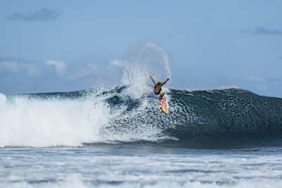 Erin Brooks surfing at Cloudbreak