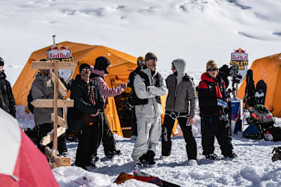 Competitors pictured in the athlete zone at the Natural Selection Tour Ski 2025 in Alaska.