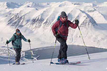 Aline Bock and Anne-Flore Marxer splitboarding in Iceland during fioming of their documentary A Land Shaped By Women.