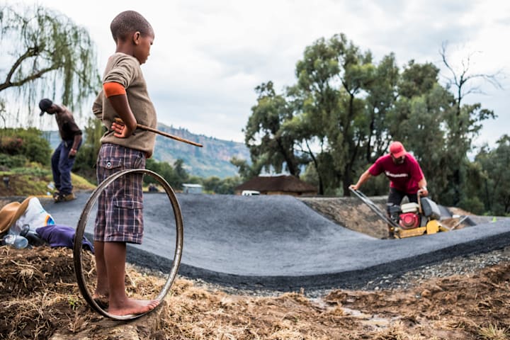 Volunteers build a pump trrack in Lesotho.