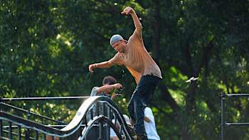 Madars Apse skates a rail during filming of Kasso