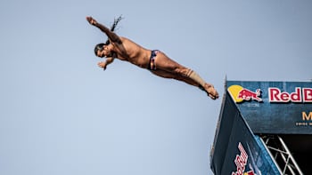 Orlando Duque of Colombia performs his last competition dive at the final stop of the Red Bull Cliff Diving World Series in Bilbao, Spain on September 14, 2019
