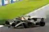 A photo of Alexander Albon and Kevin Magnussen jostle for position during the 2019 F1 Grand Prix of Italy.
